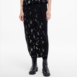 Sarah Pacino black knit scattered letters midi skirt small